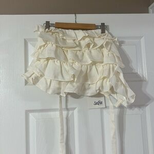 NWT ruffled tube top with lace up back